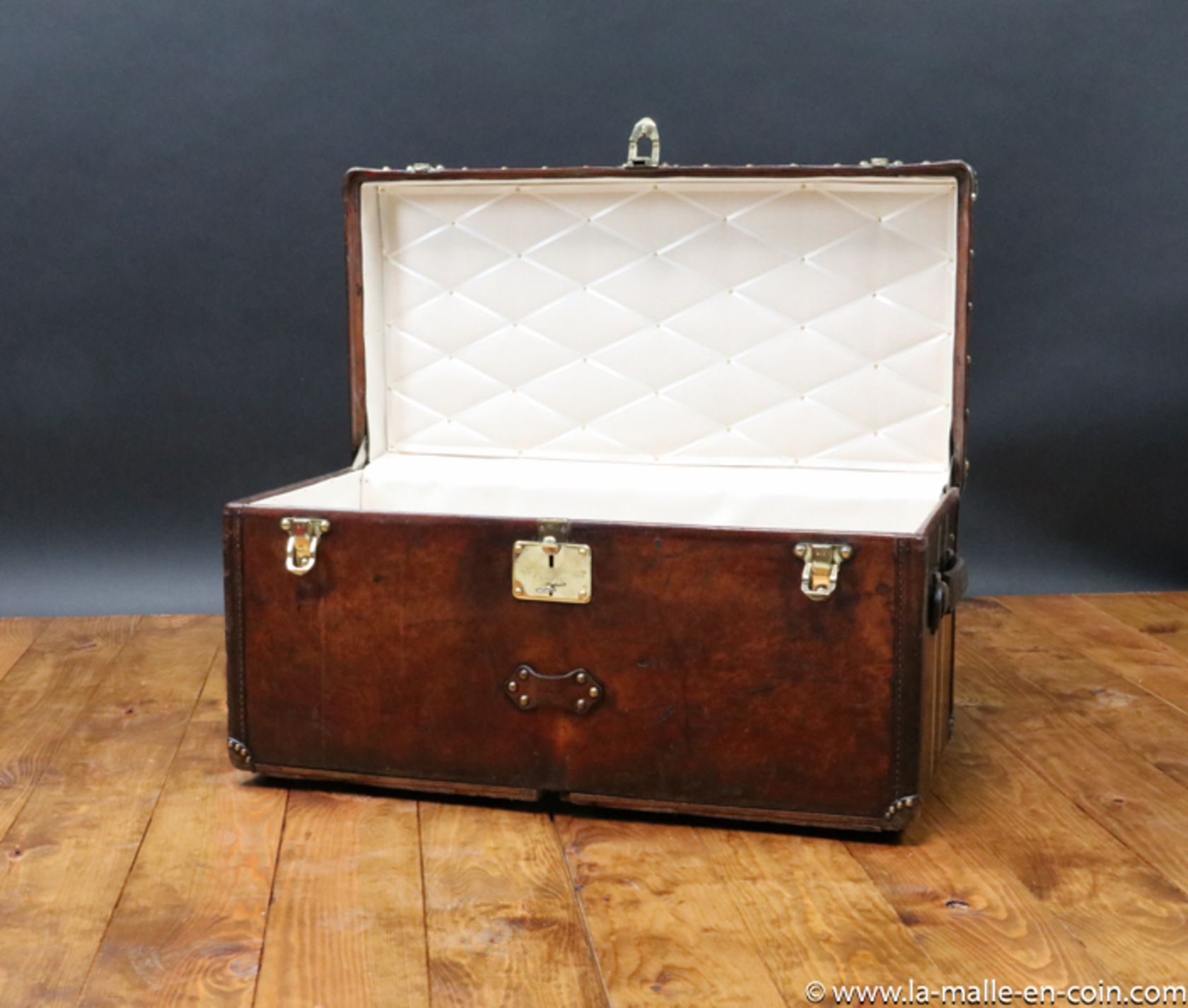 1920 Louis Vuitton leather trunk for sale on Luxify